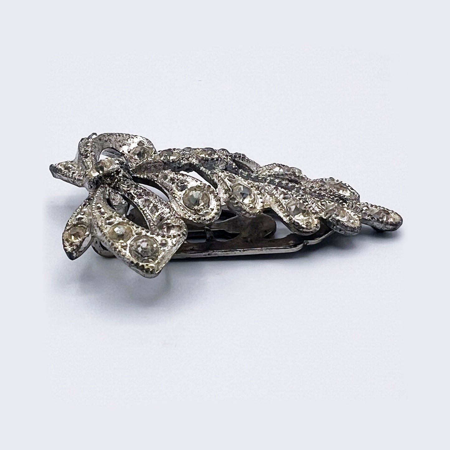 1930s Little Nemo Silver Tone Metal and Clear Rhinestone Dress Clip