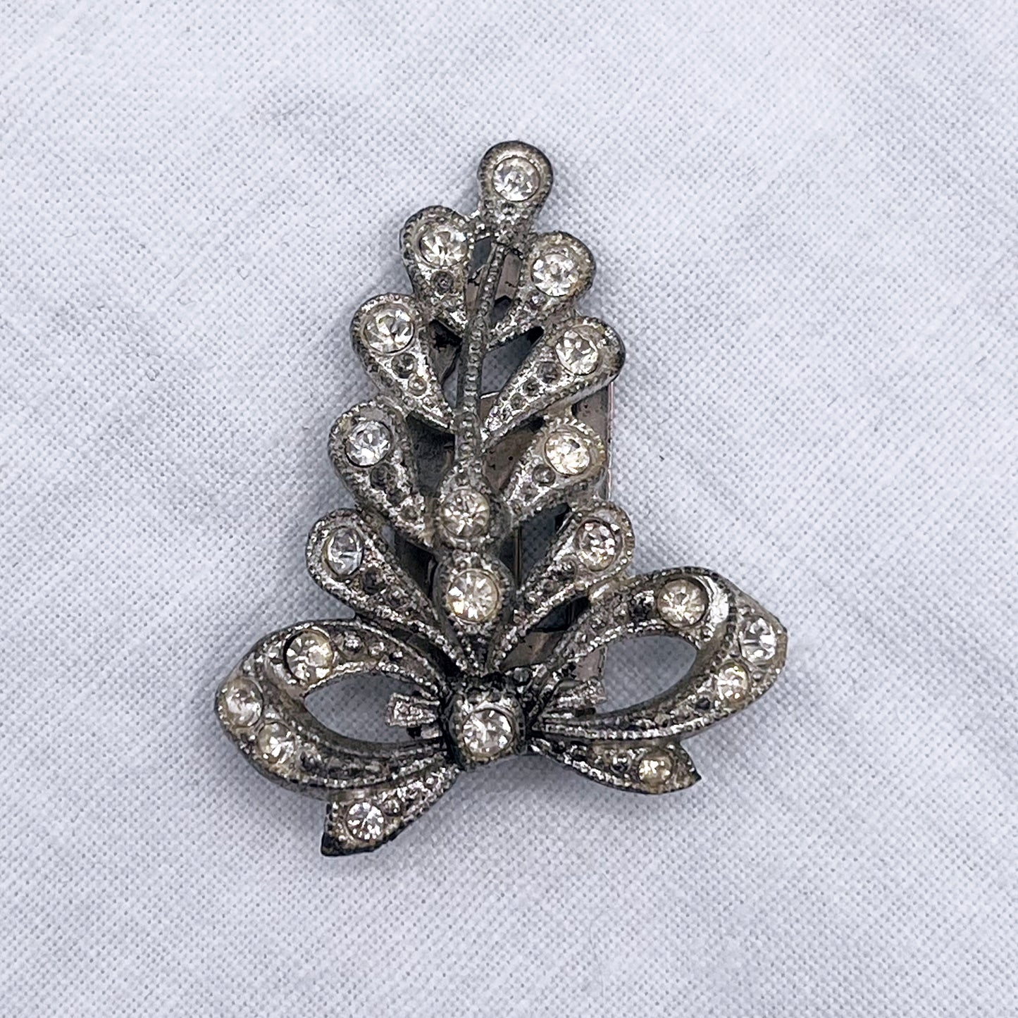 1930s Little Nemo Silver Tone Metal and Clear Rhinestone Dress Clip