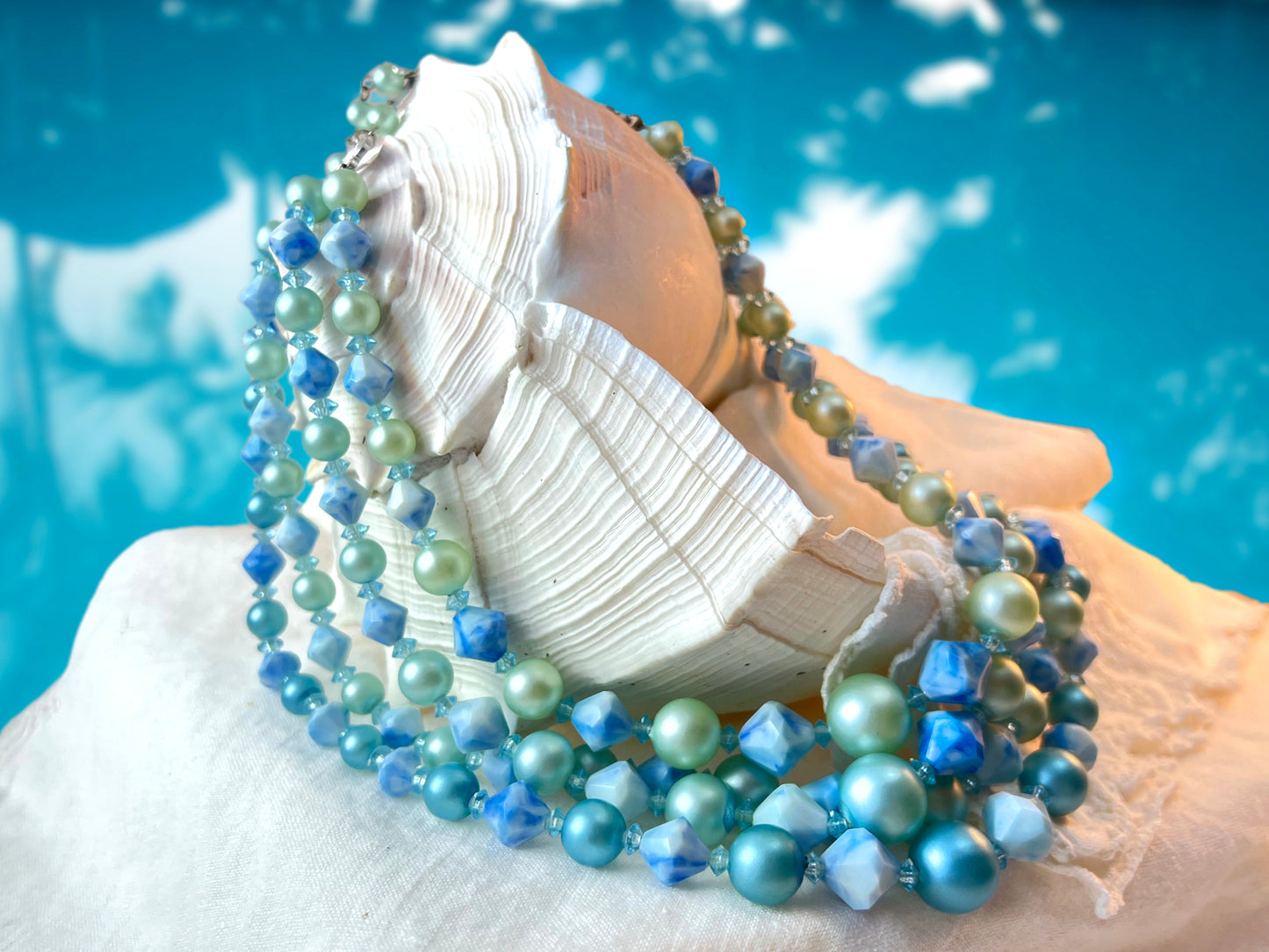 Vintage Hong Kong 4 Strand Light Blue Lucite Beaded Necklace